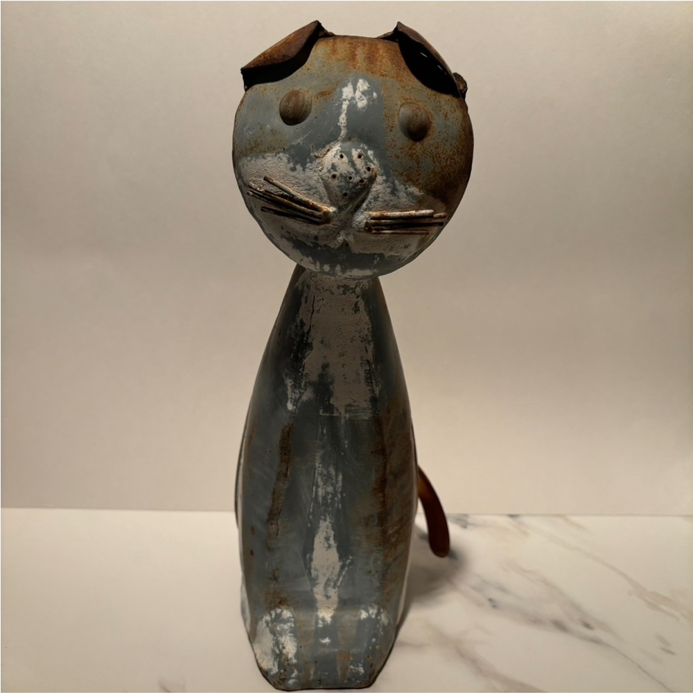 Rustic metal cat watering can